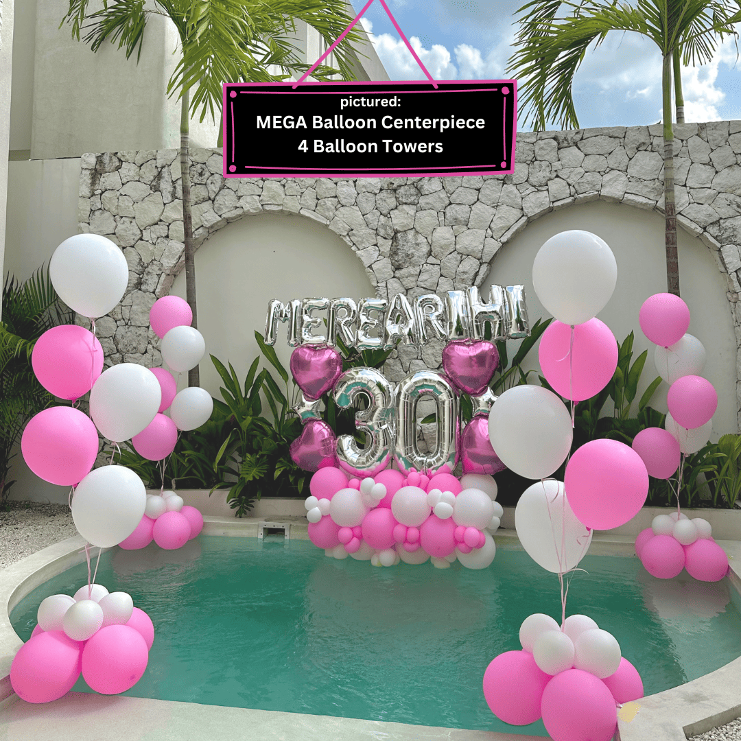 balloon towers beside Bali villa pool